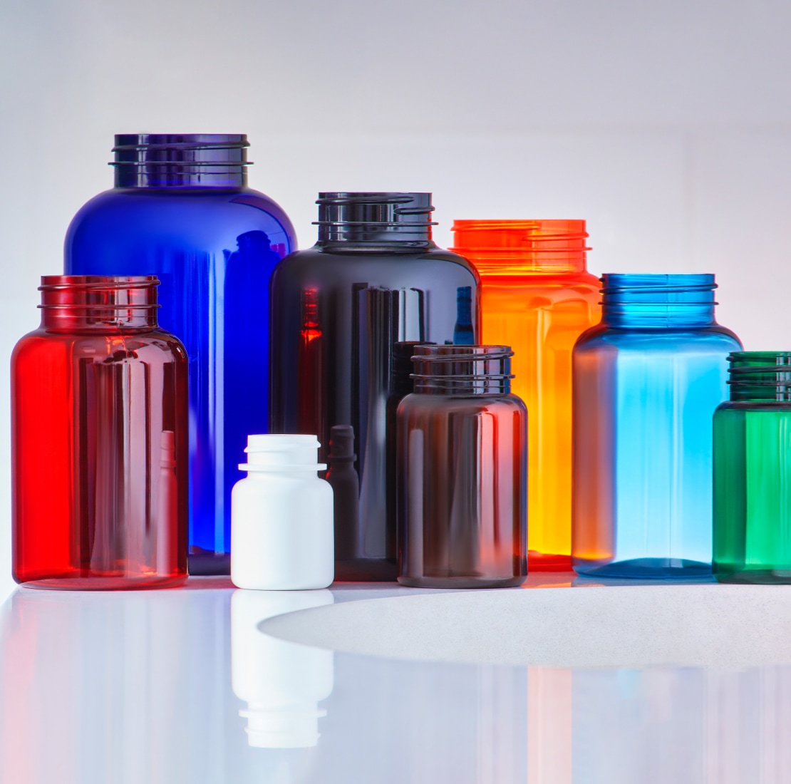 assorted bottles with different colors for nutraceutical and supplements